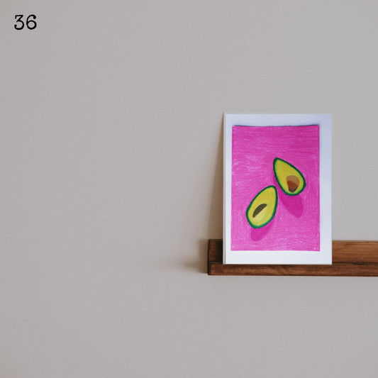 An oil pastel painting of two avocados against a pink background on a wooden shelf