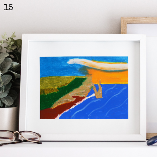 A white framed oil pastel painting of Etretat at sunset