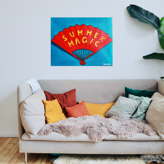 An oil painting of a red hand fan against a blue background above a couch on a white wall