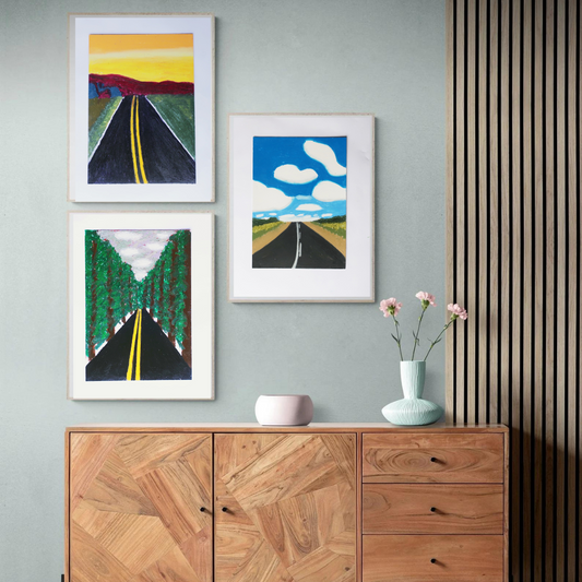 Three framed oil pastel paintings of road in a boho decor
