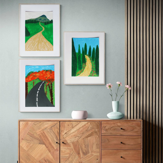 Three framed oil pastel paintings of road in a boho decor