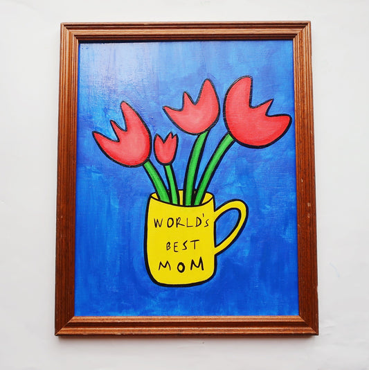 An oil painting of four red tulips in a yellow mug with the words world's best mom on a blue background in a thrifted frame
