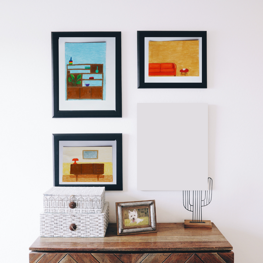 Three black framed oil pastel paintings of vintage interiors in a boho decor