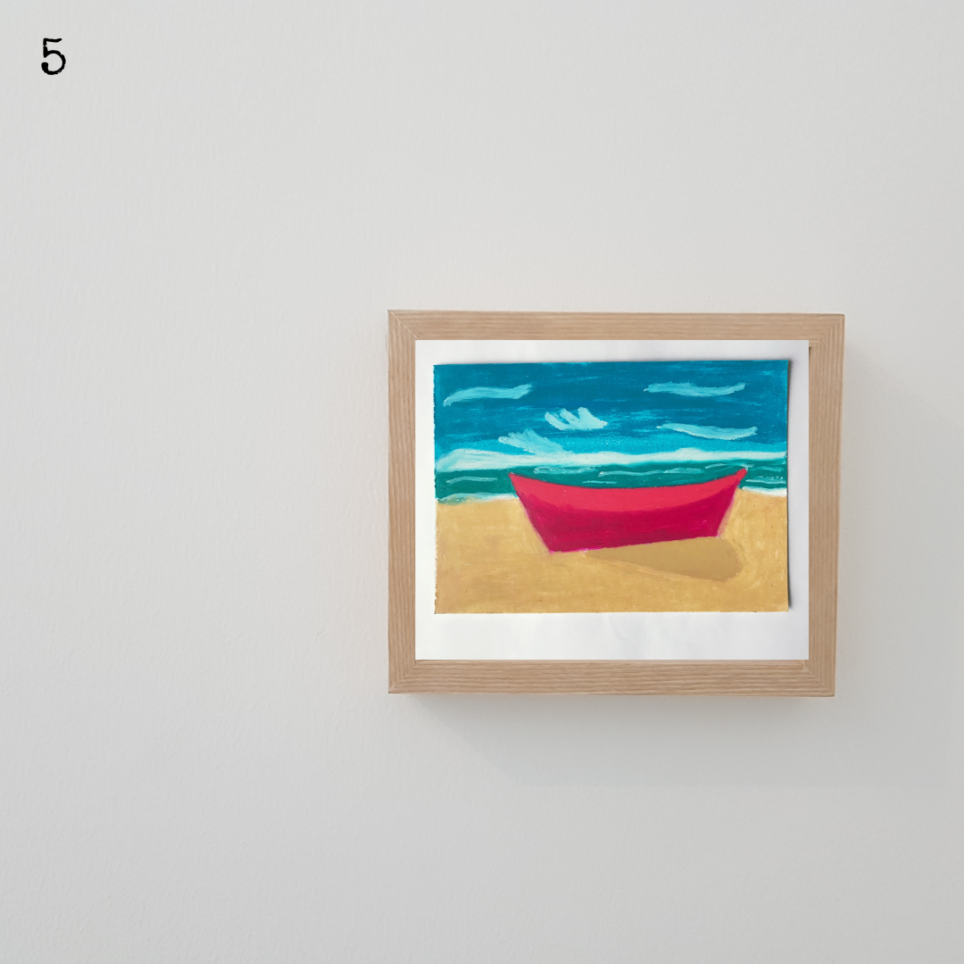 A wooden framed oil pastel painting of a pink beach on the beach under the blue sky