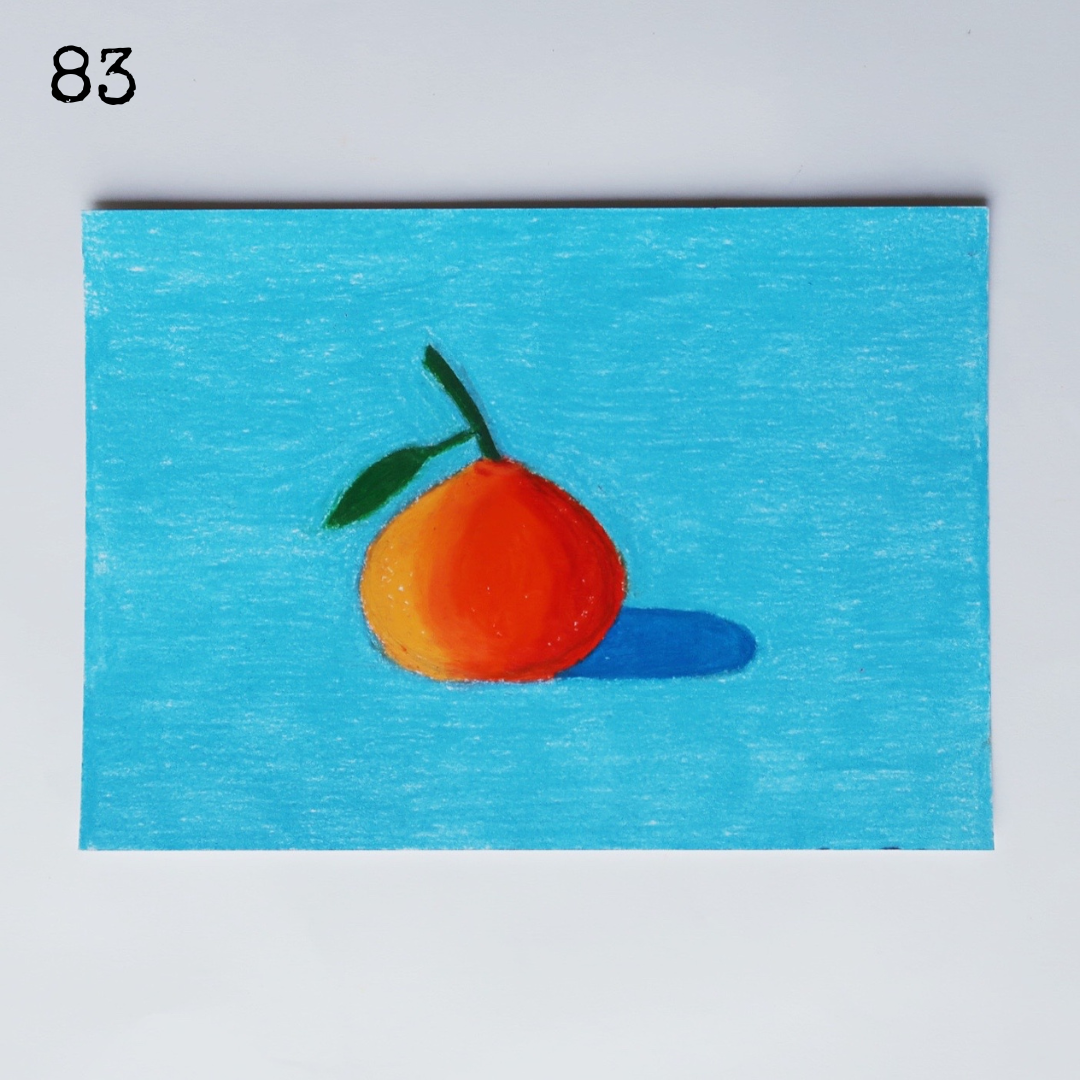 An oil pastel painting of an orange clementine against a blue background