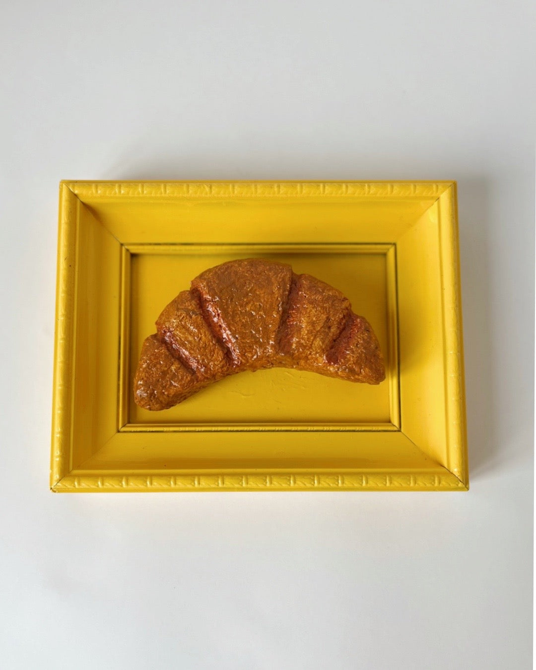Lifesized croissants yellow frame