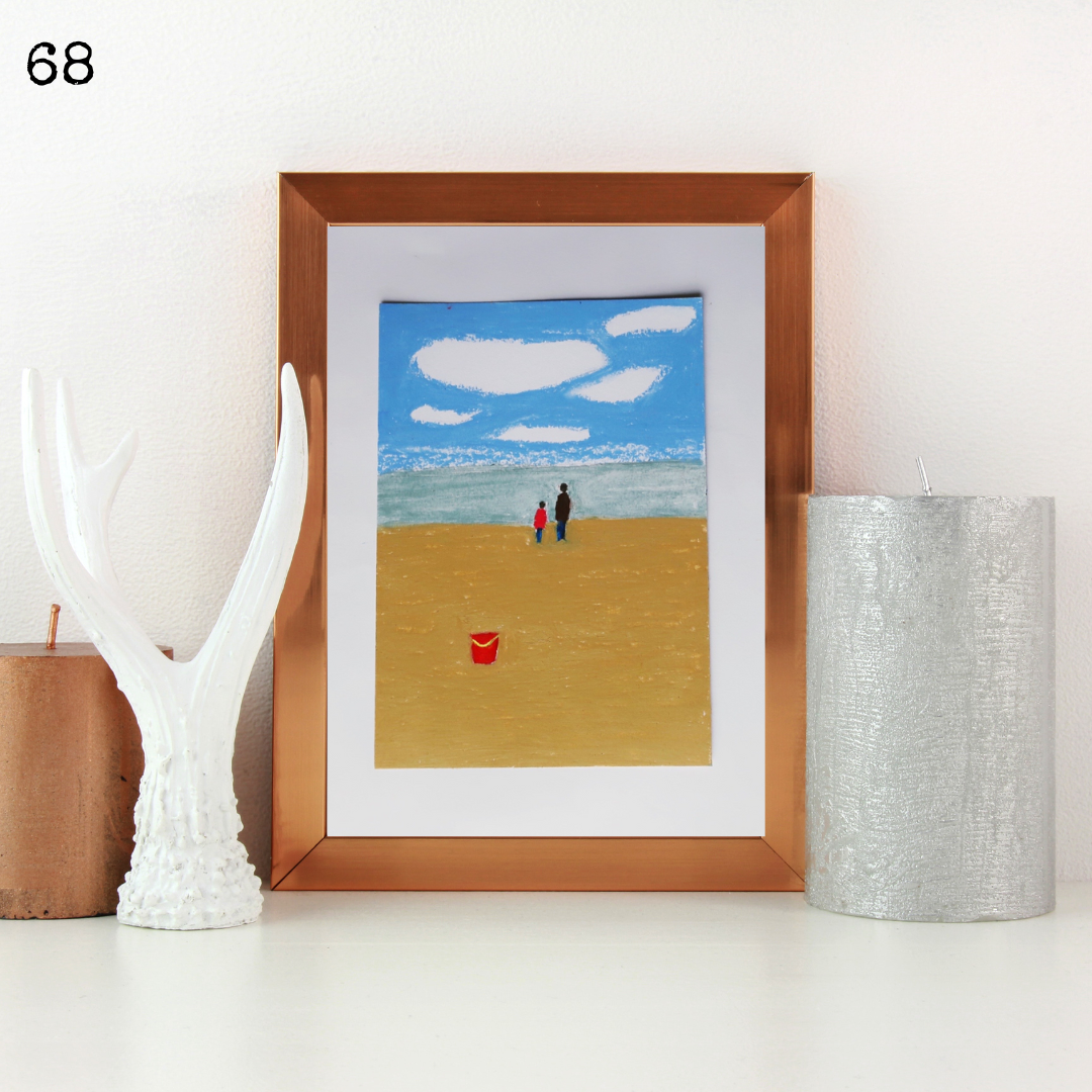 A wooden framed oil pastel painting showing a father and a child on the beach