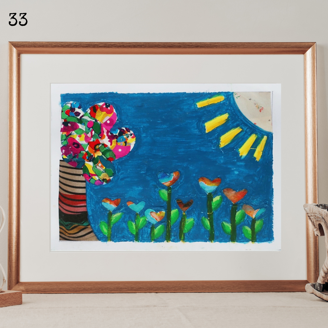 A framed oil pastel painting and collage of heart shaped flowers, a tree on a sunny day