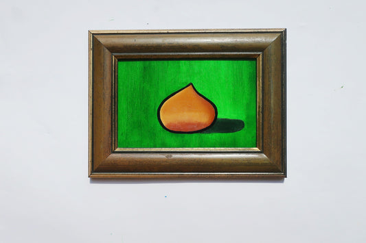 An oil painting of a chestnut on a green background in a thrifted frame