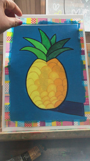Unwrapping an oil painting of a happy pineapple
